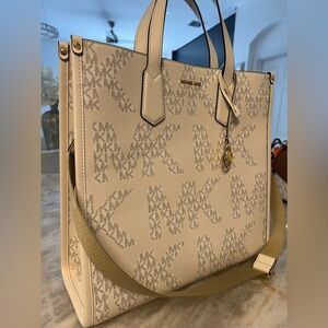 Michael Kors brand  new  with  tags,  medium ,  you  can use  as a  crossbody